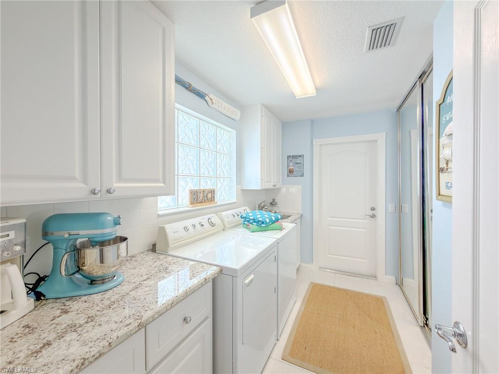 3356 Cayman Lane Naples, FL 34119 - Photo 31 of 46 Laundry room, Utility sink and great ensuite closet