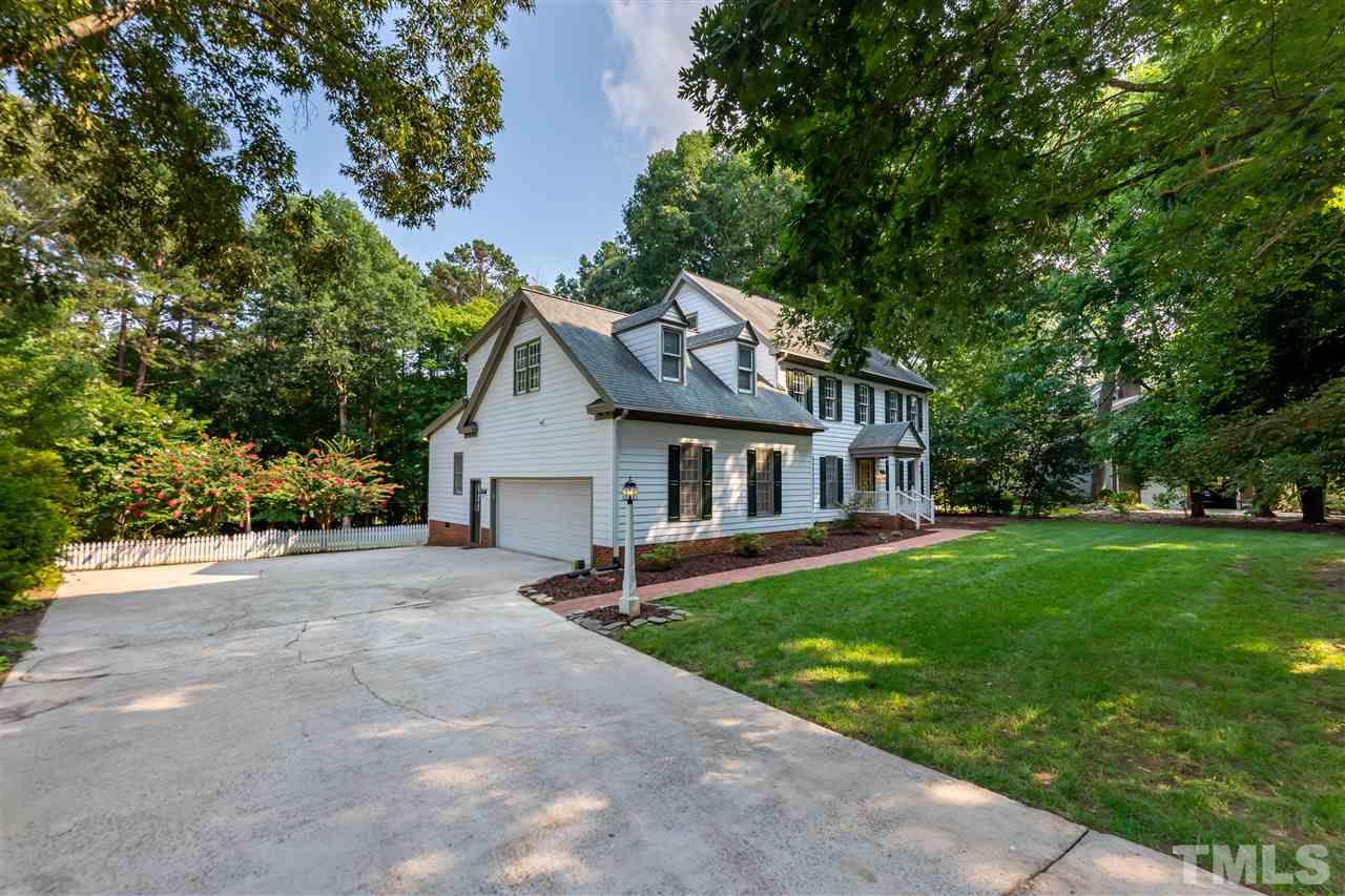 2408 Heartley Drive Raleigh, NC 27615 - Photo 2 of 26 a view of a house with backyard and sitting area