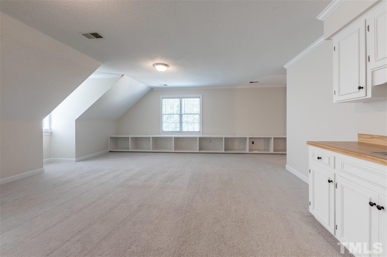 2408 Heartley Drive Raleigh, NC 27615 - Photo 16 of 26 a view of an empty room with a window