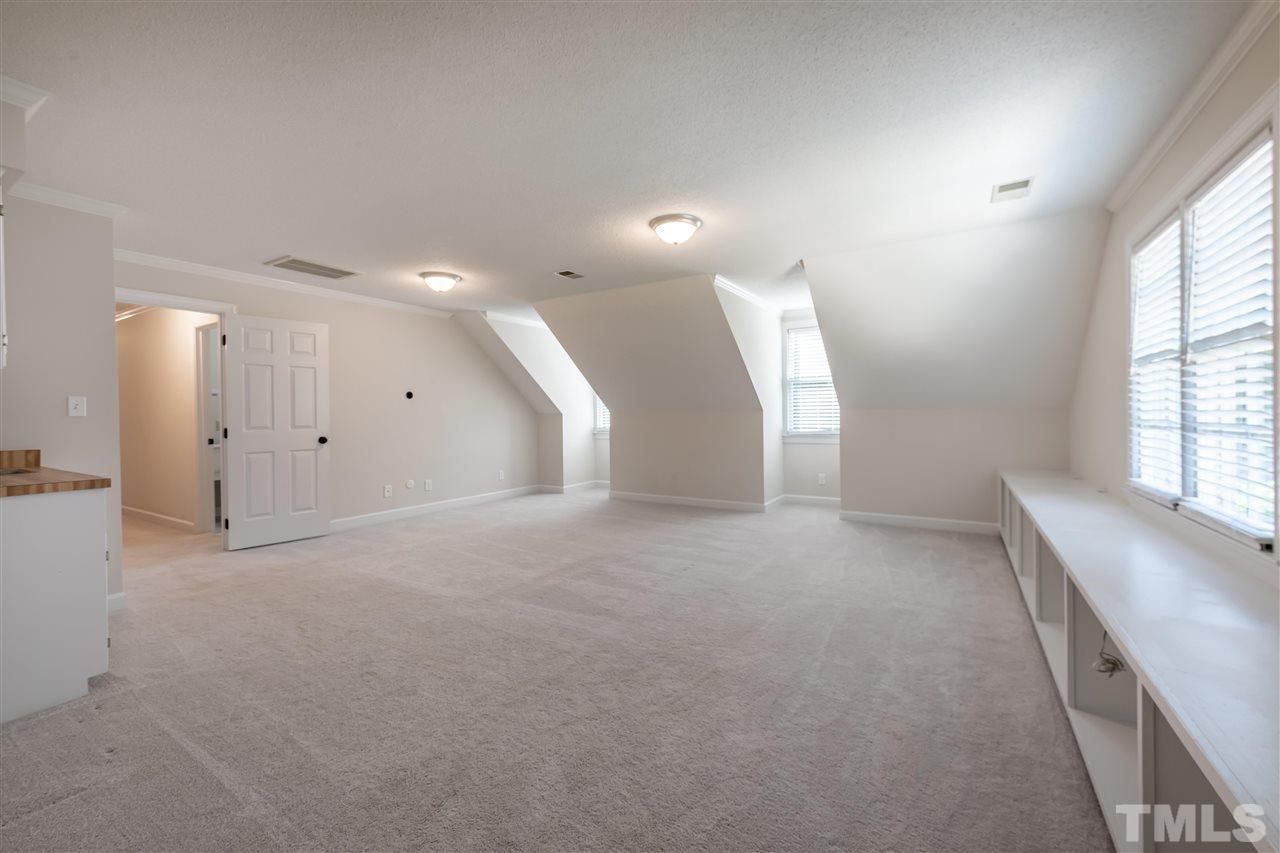 2408 Heartley Drive Raleigh, NC 27615 - Photo 17 of 26 a view of an empty room with a window