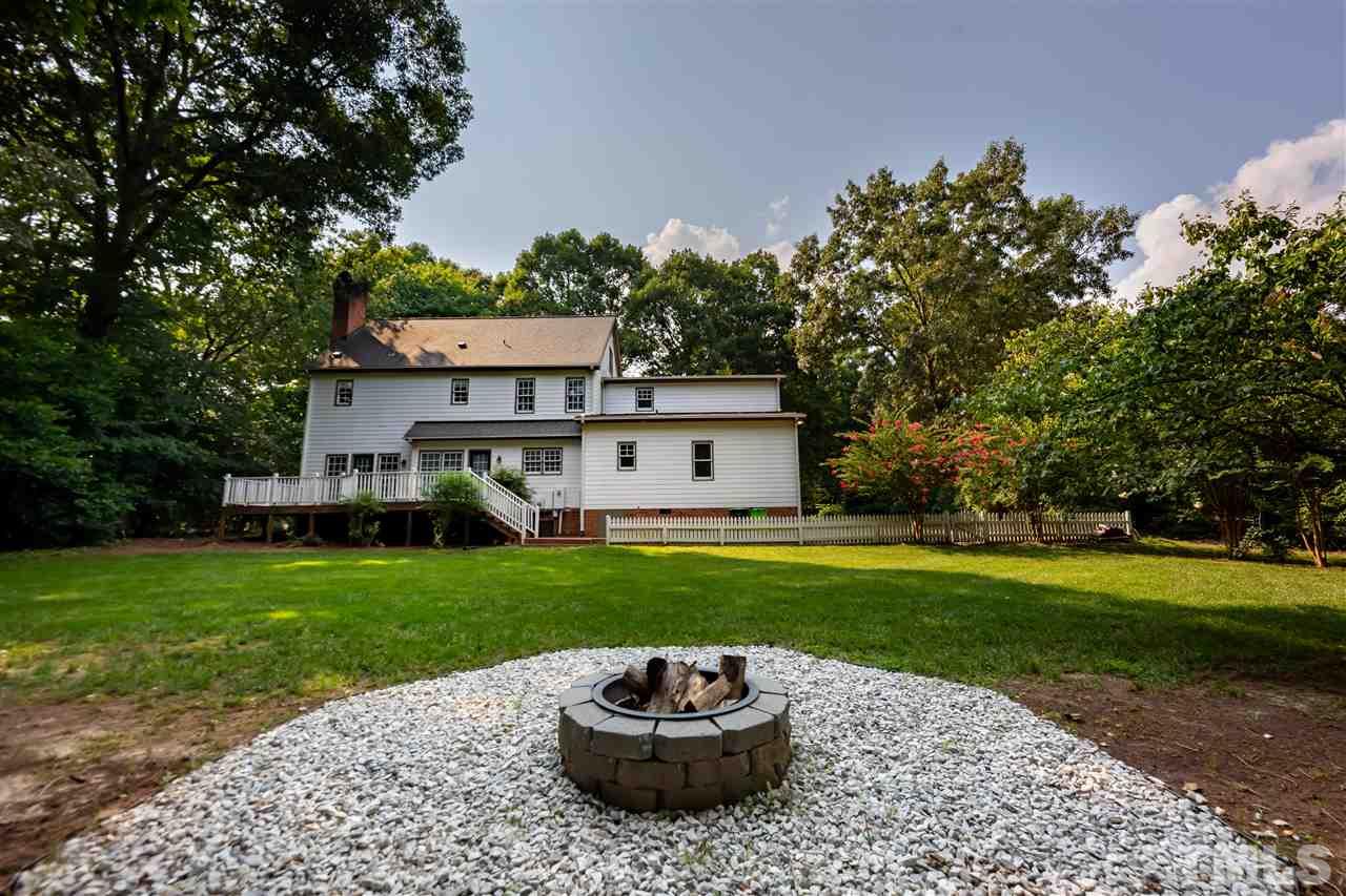 2408 Heartley Drive Raleigh, NC 27615 - Photo 18 of 26 a view of a backyard with a garden and plants