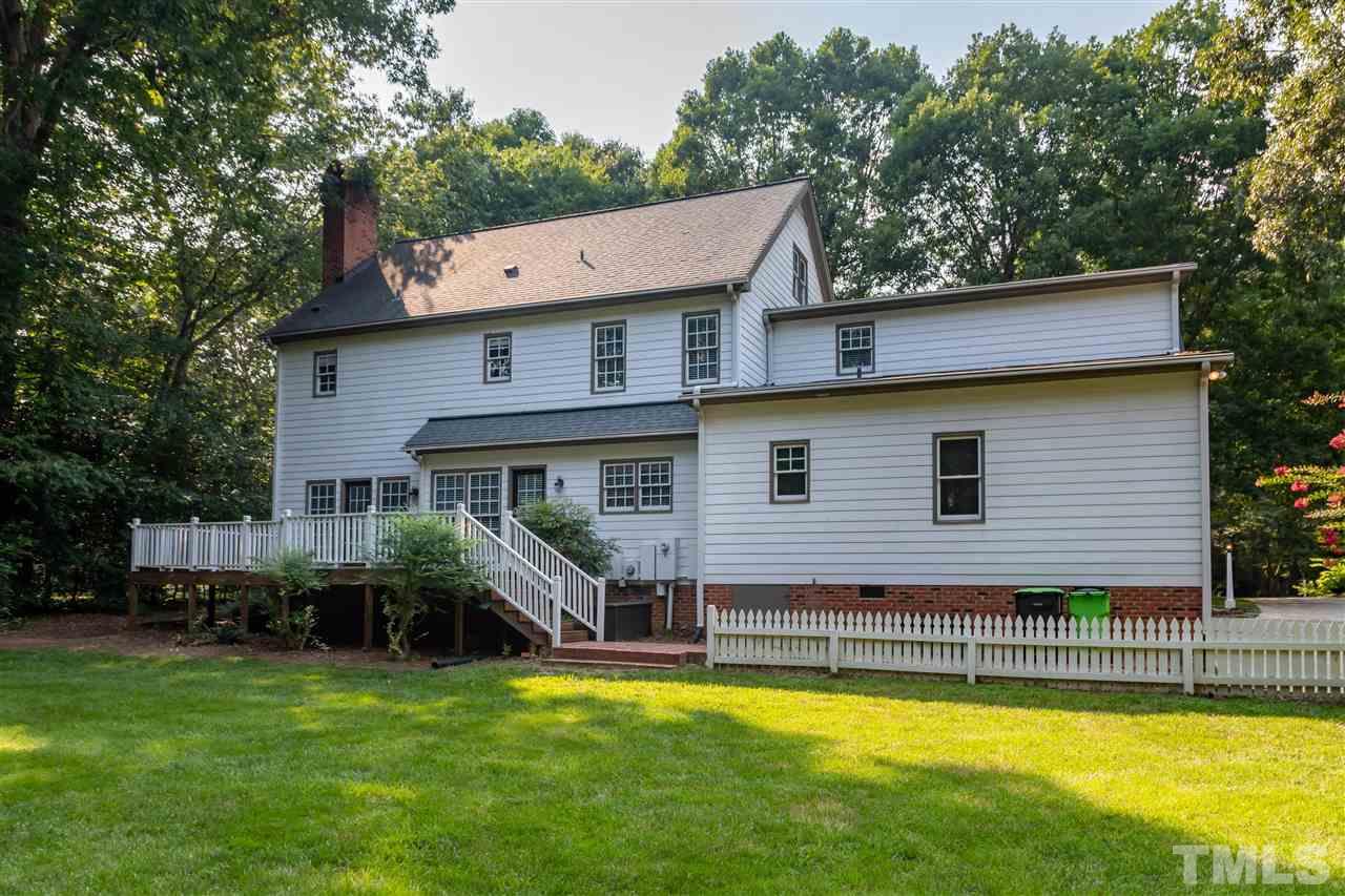2408 Heartley Drive Raleigh, NC 27615 - Photo 26 of 26 a view of a house with a yard patio and swimming pool