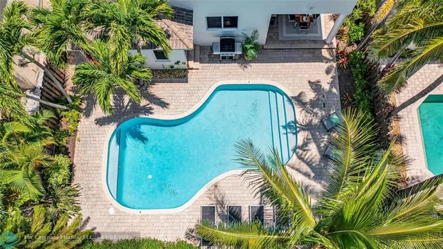 an aerial view of a swimming pool