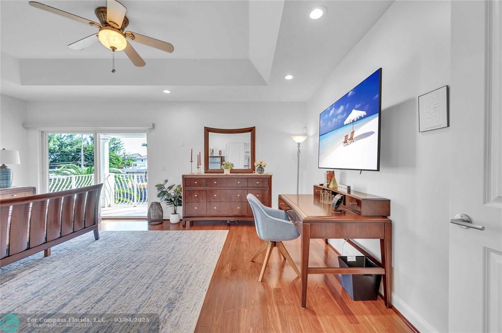 3315 Northeast 17th Street Fort Lauderdale, FL 33305 - Photo 20 of 41 a living room with furniture and a wooden floor