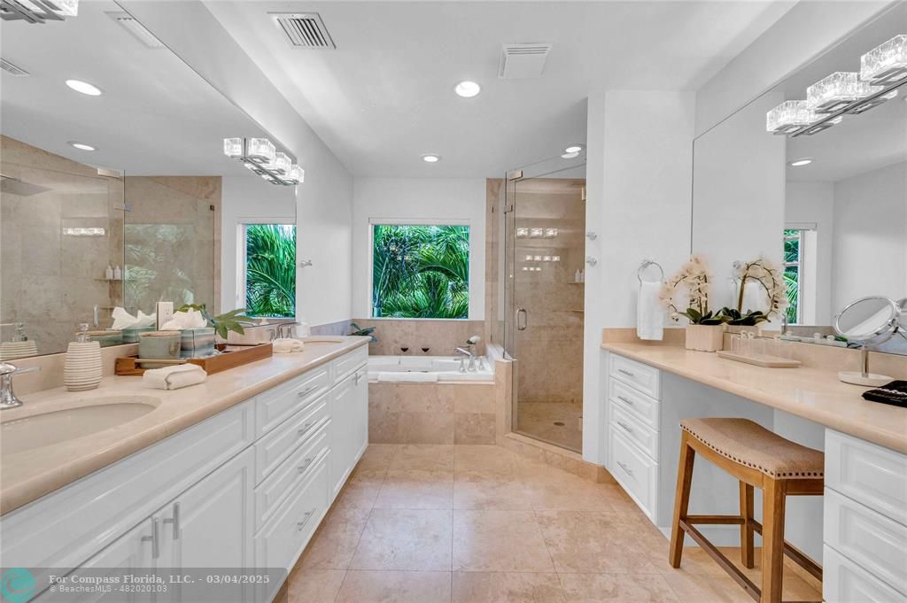 3315 Northeast 17th Street Fort Lauderdale, FL 33305 - Photo 22 of 41 a large white kitchen with a large window