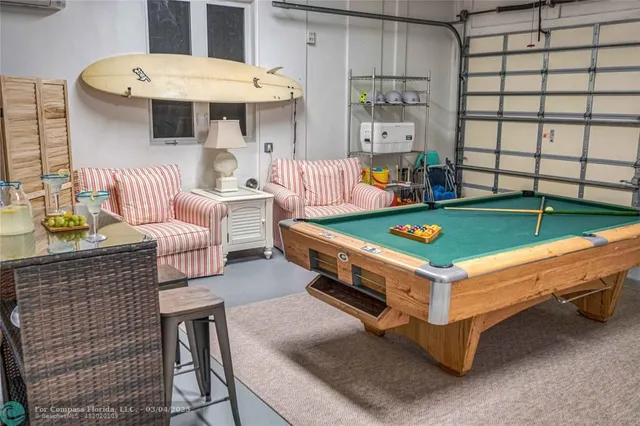a bathroom with a sink toilet a mirror and shower