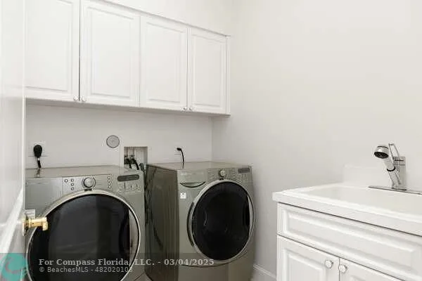 a view of a house with swimming pool and sitting area
