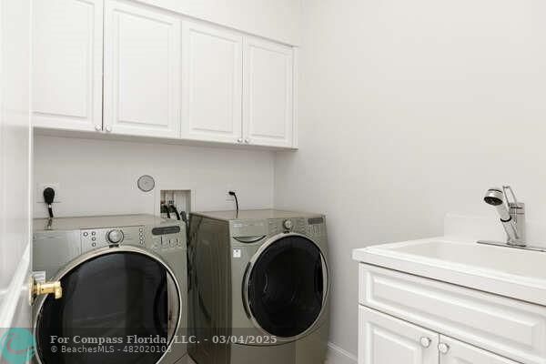 3315 Northeast 17th Street Fort Lauderdale, FL 33305 - Photo 36 of 41 a utility room with dryer and washer