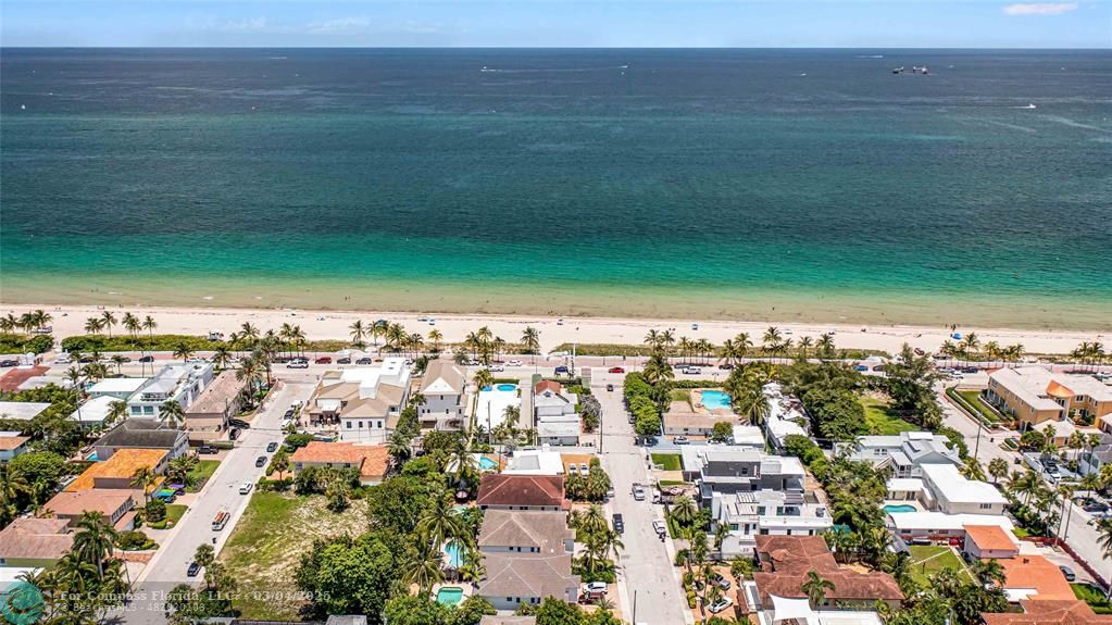 3315 Northeast 17th Street Fort Lauderdale, FL 33305 - Photo 40 of 41 an aerial view of a house with a lake