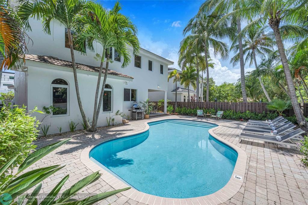3315 Northeast 17th Street Fort Lauderdale, FL 33305 - Photo 5 of 41 a view of a swimming pool with a house