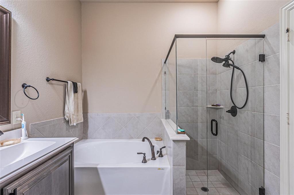 4201 Misty Ridge Street Mesquite, TX 75181 - Photo 25 of 39 Bathroom featuring shower with separate bathtub and vanity