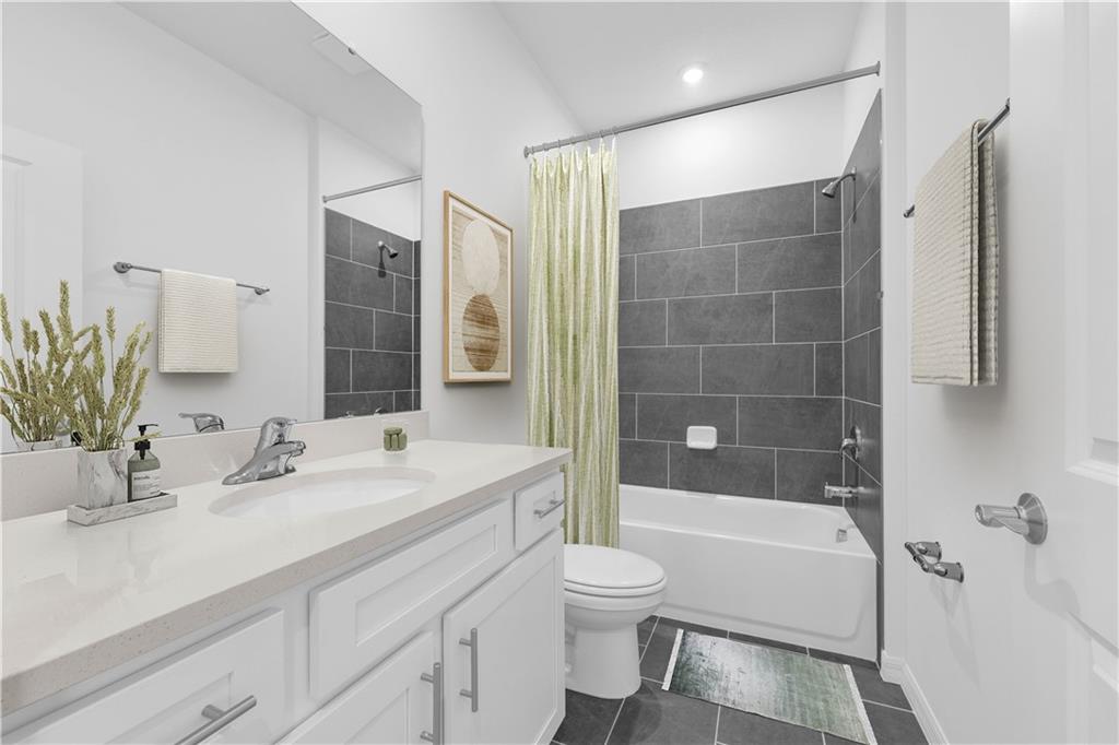 328 Cavalier Lane Acworth, GA 30102 - Photo 12 of 42 a bathroom with a sink a toilet and shower