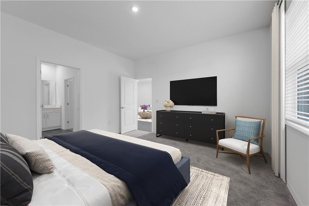 328 Cavalier Lane Acworth, GA 30102 - Photo 14 of 42 a bedroom with a bed a couch and a flat screen tv