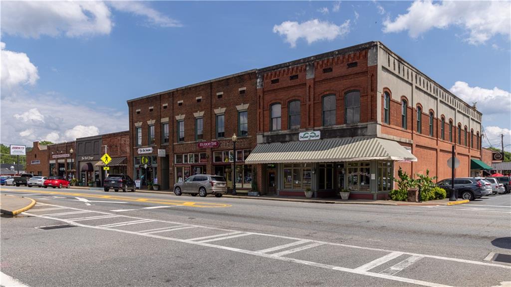 328 Cavalier Lane Acworth, GA 30102 - Photo 32 of 42 a front view of a building with street
