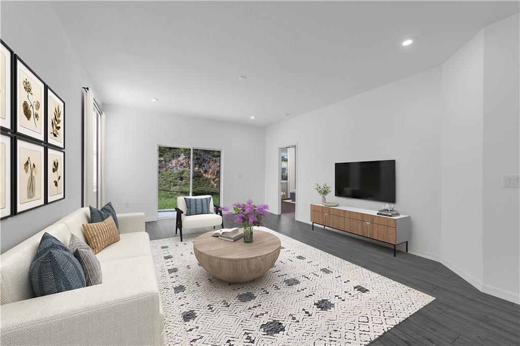 328 Cavalier Lane Acworth, GA 30102 - Photo 7 of 42 a living room with furniture and a flat screen tv