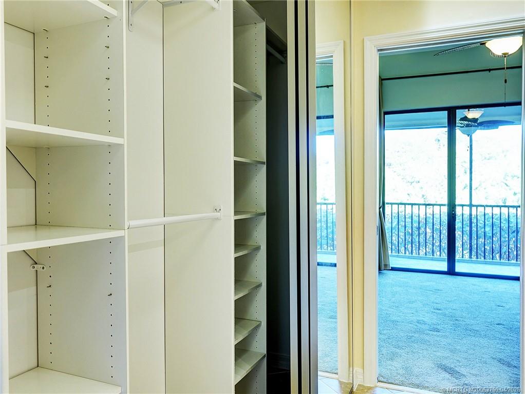5290 Southeast Seascape Way, Unit 201 Stuart, FL 34997 - Photo 21 of 30 Custom closets main bedroom