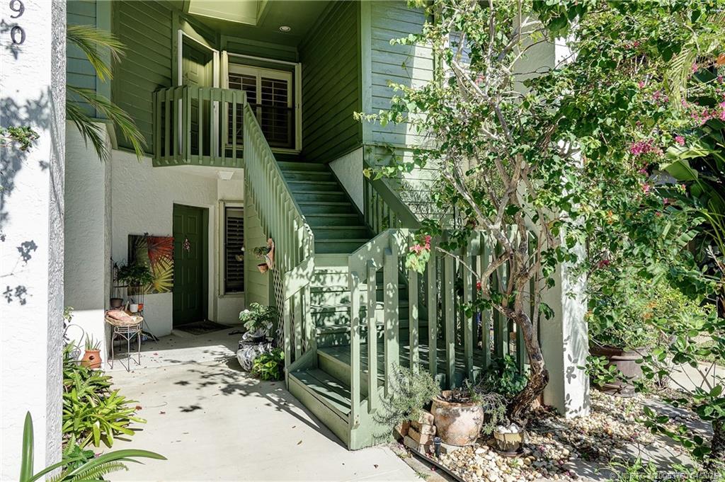 5290 Southeast Seascape Way, Unit 201 Stuart, FL 34997 - Photo 22 of 30 a view of a house with a tree