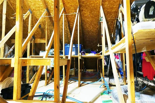 a view of swimming pool with a house in the background