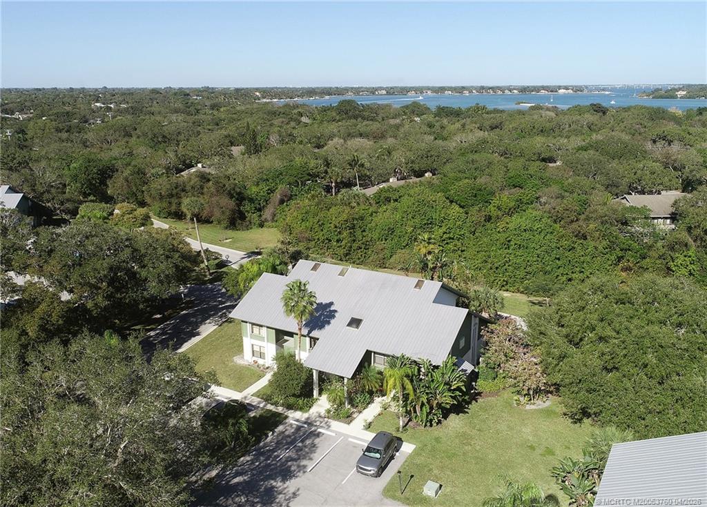 5290 Southeast Seascape Way, Unit 201 Stuart, FL 34997 - Photo 27 of 30 an aerial view of a house with a yard