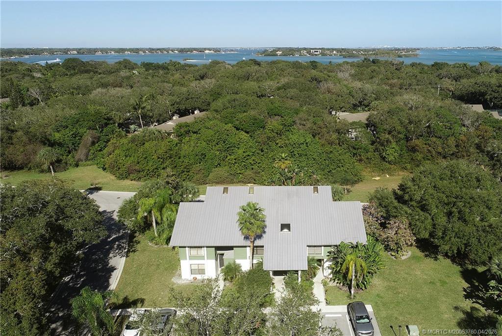 5290 Southeast Seascape Way, Unit 201 Stuart, FL 34997 - Photo 28 of 30 an aerial view of a house with a garden