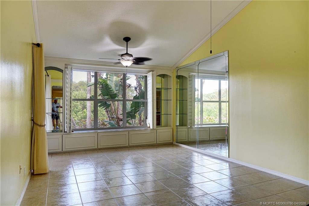 5290 Southeast Seascape Way, Unit 201 Stuart, FL 34997 - Photo 8 of 30 a view of an empty room with a window