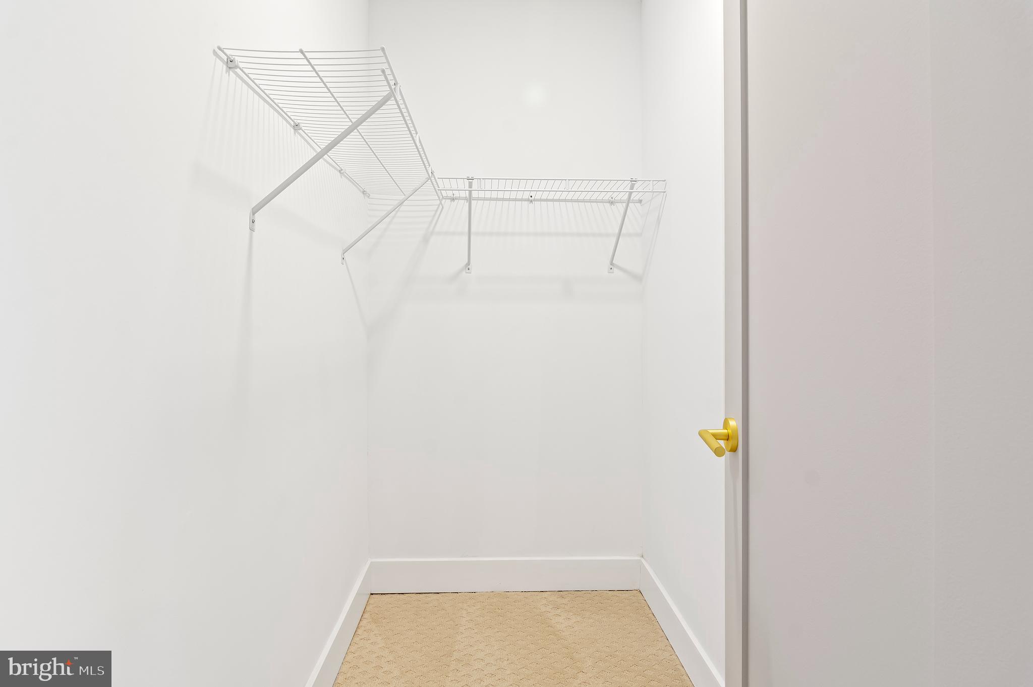 5905 Glenkirk Road Baltimore, MD 21239 - Photo 18 of 31 a view of small space with racks on the wall