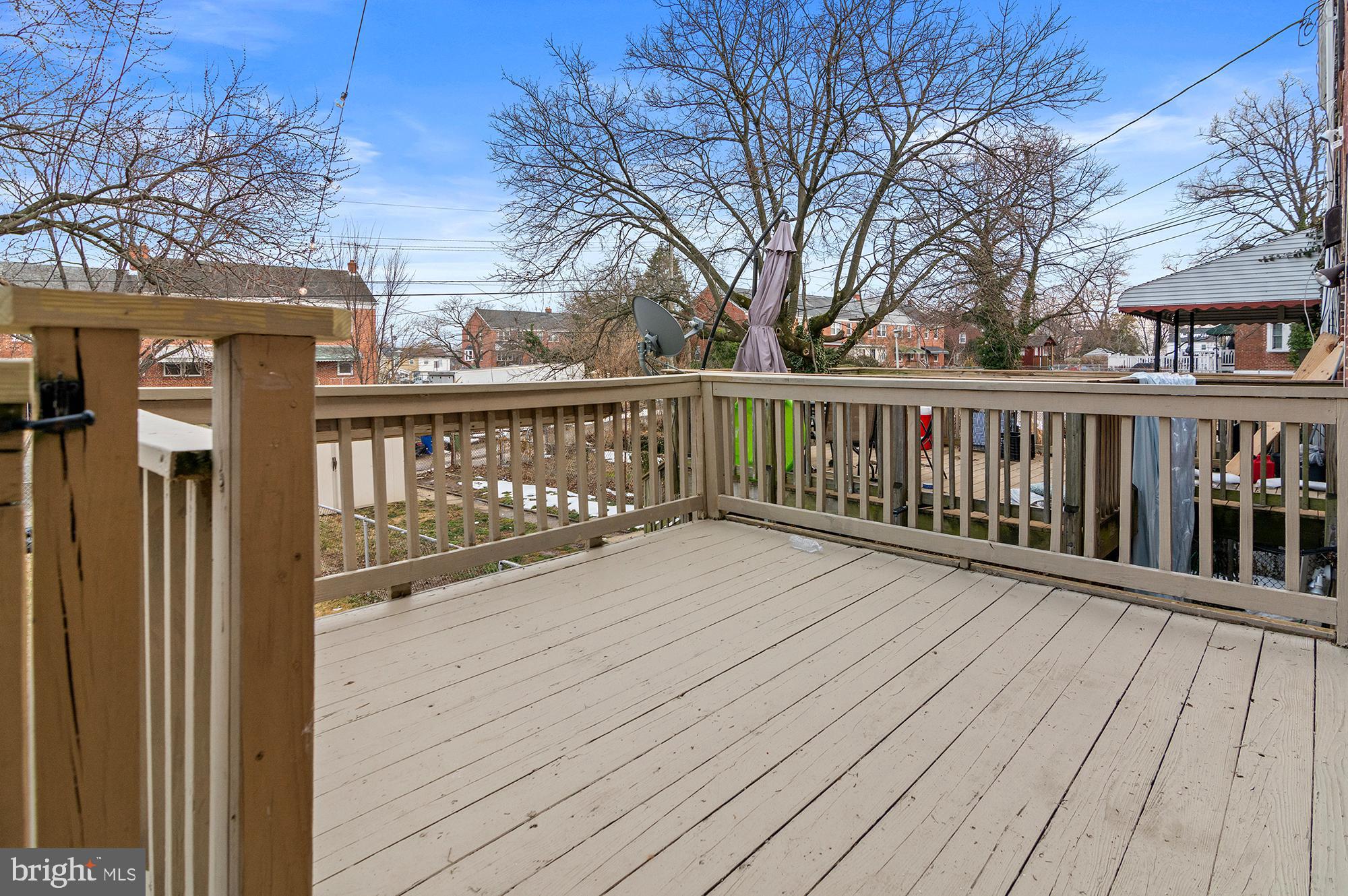 5905 Glenkirk Road Baltimore, MD 21239 - Photo 30 of 31 a view of a wooden deck