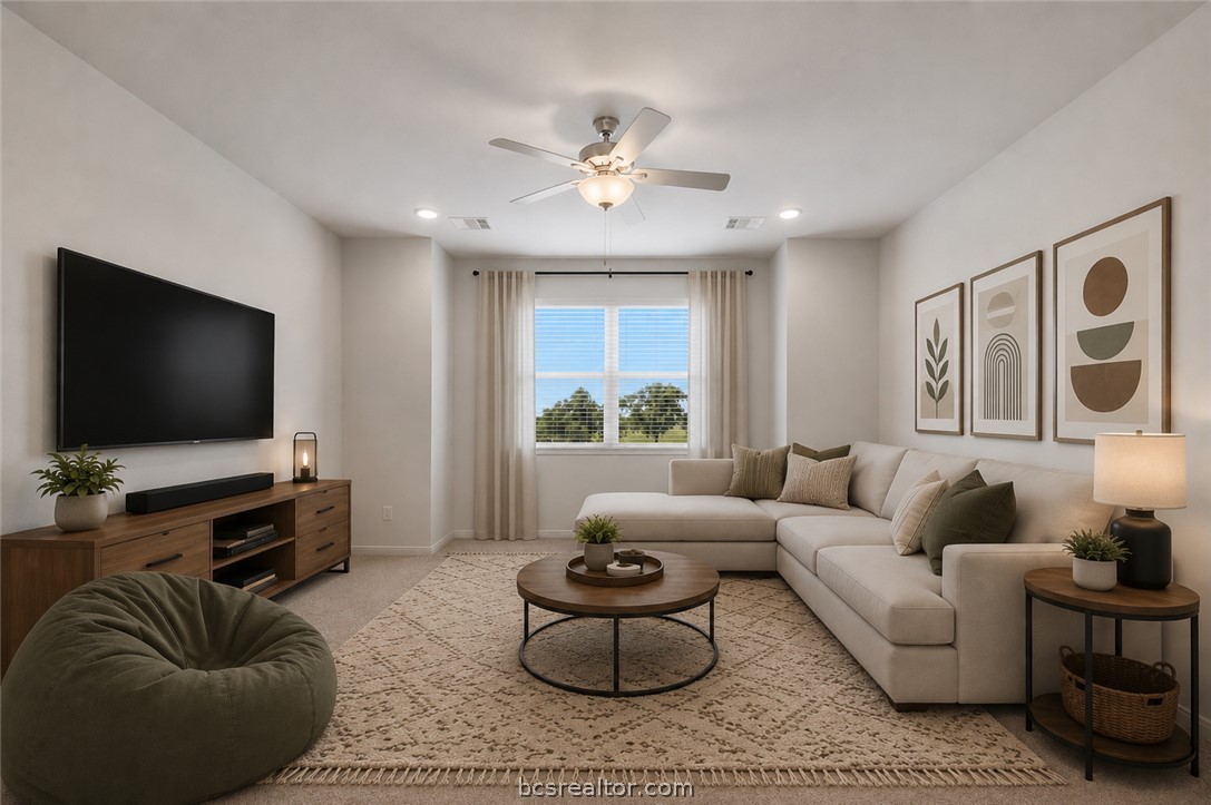 1922 Viva Road Bryan, TX 77807 - Photo 33 of 45 Versatile upstairs loft provides endless possibilities as a media room, playroom, game room, or additional living space — virtually staged as a second living area/media room.