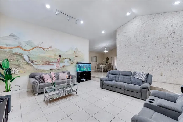 a living room with furniture and a couch
