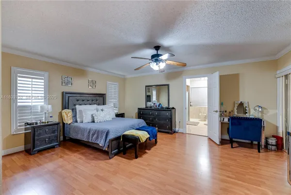 a view of a livingroom with furniture and a flat screen tv
