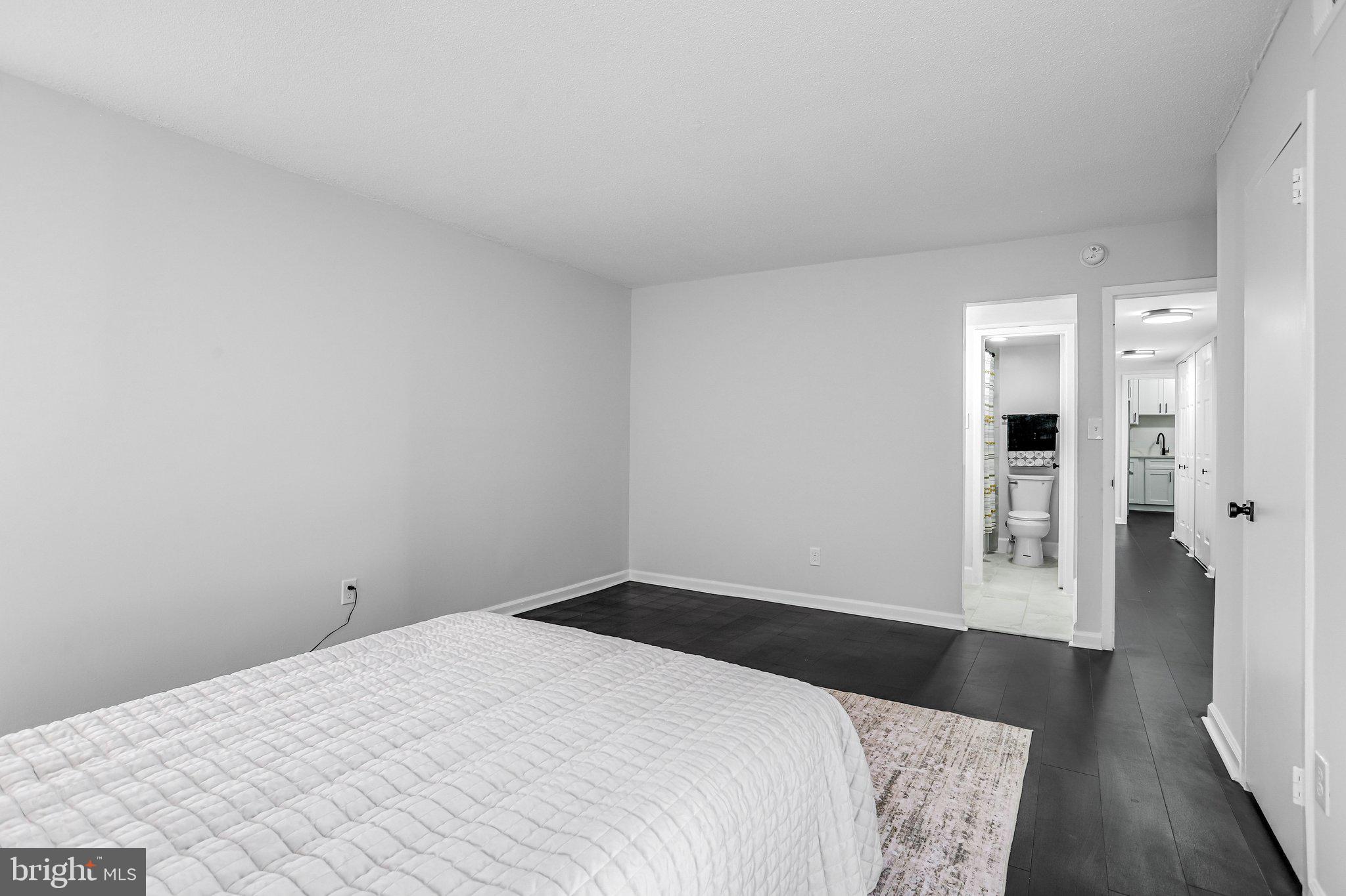 1836 Metzerott Road, Unit 627 Adelphi, MD 20783 - Photo 16 of 27 a bedroom with a bed and closet