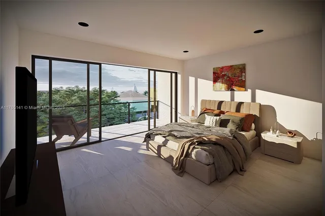 a spacious bedroom with a bed and a large window