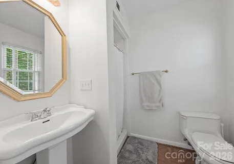 a bathroom with a sink and a toilet