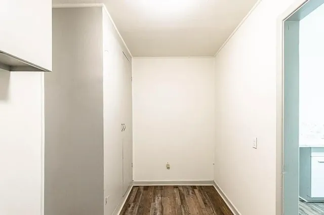 a view of bathroom with a sink and a window