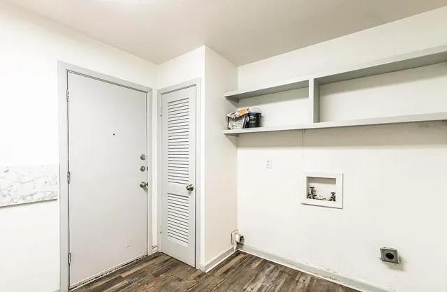 a view of a hallway with closet