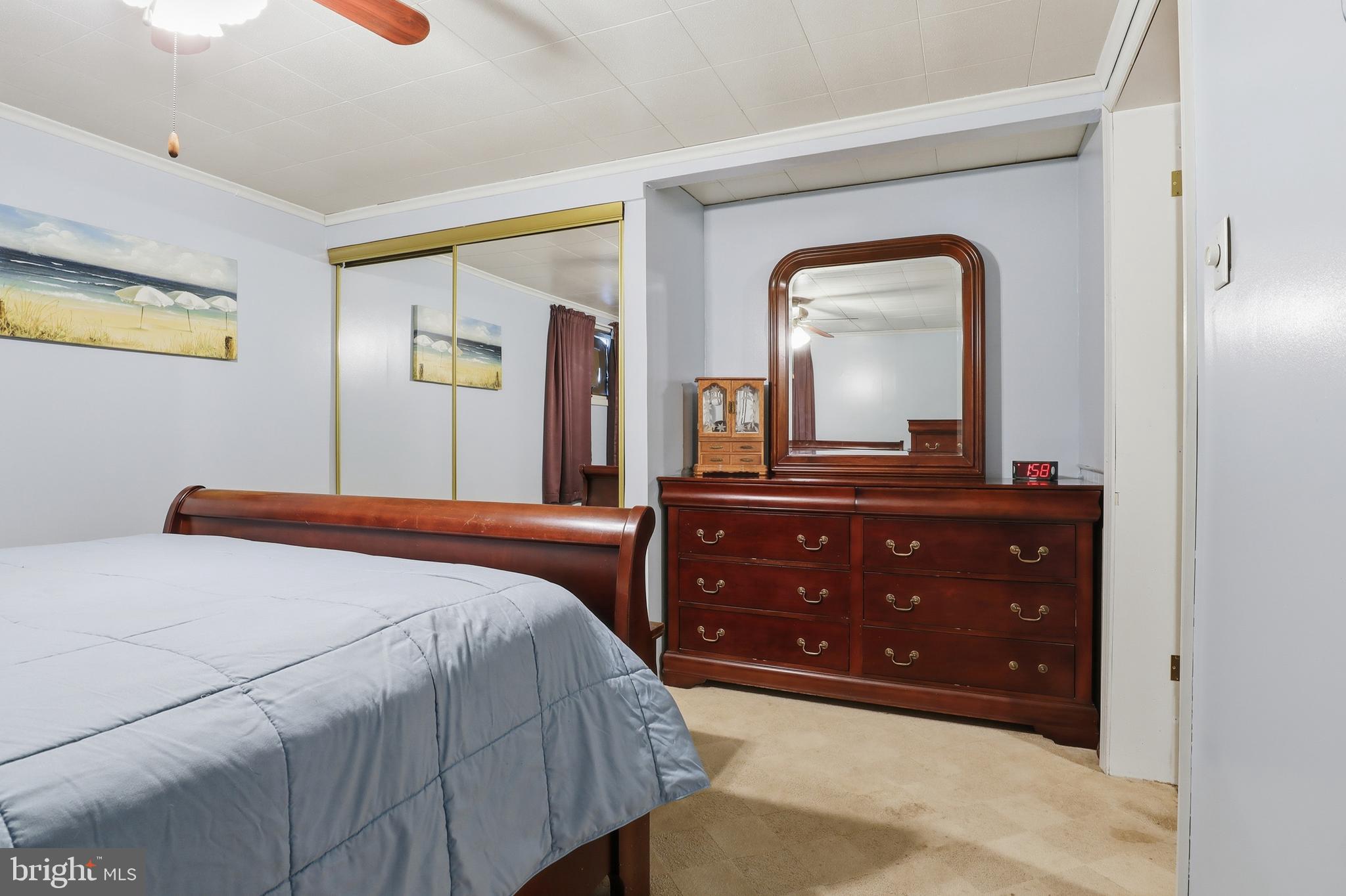 225 North Main Street Manchester, PA 17345 - Photo 18 of 53 a bedroom with a bed and a large mirror on dresser