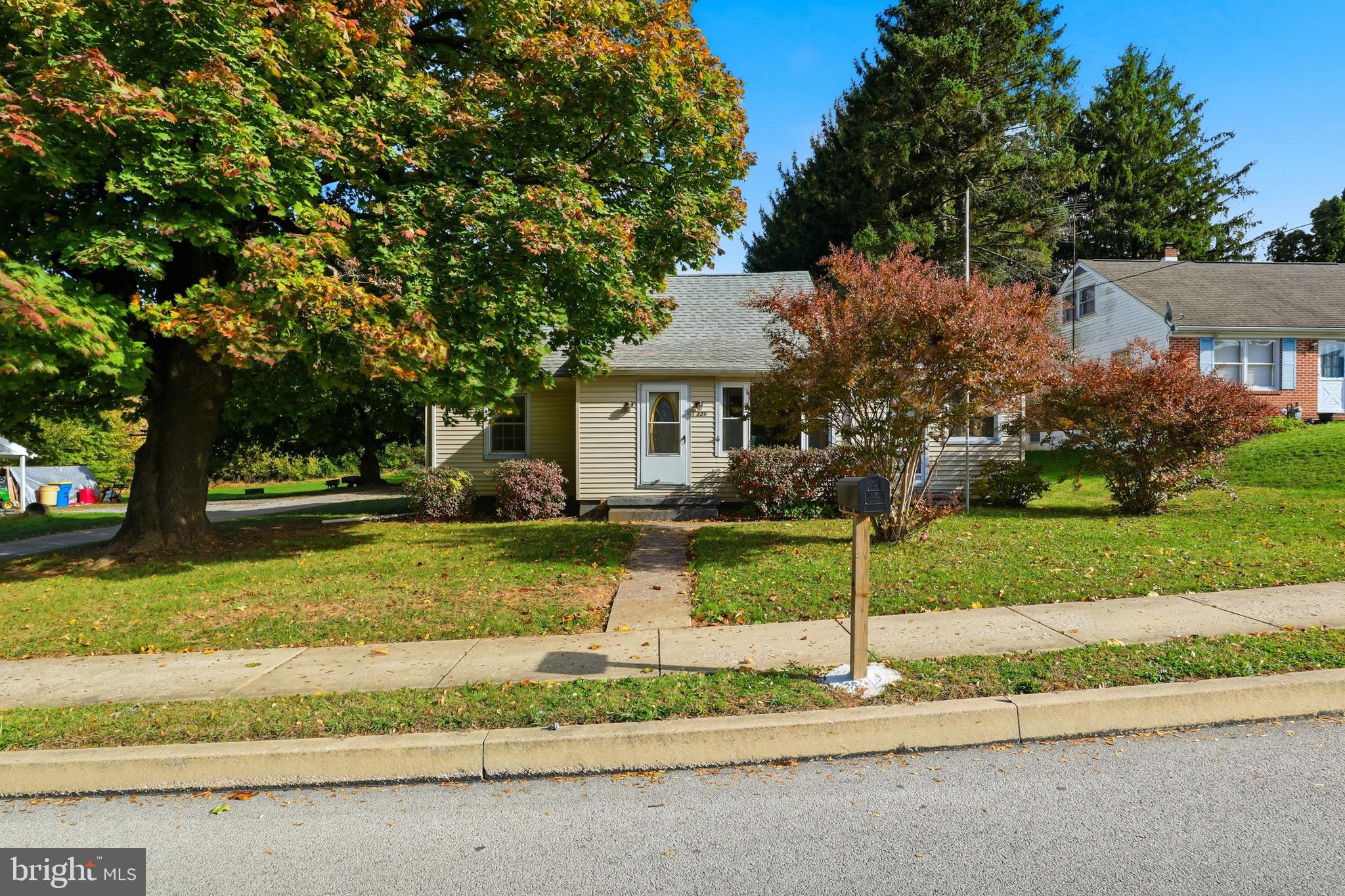 225 North Main Street Manchester, PA 17345 - Photo 2 of 53 front view of a house with a yard