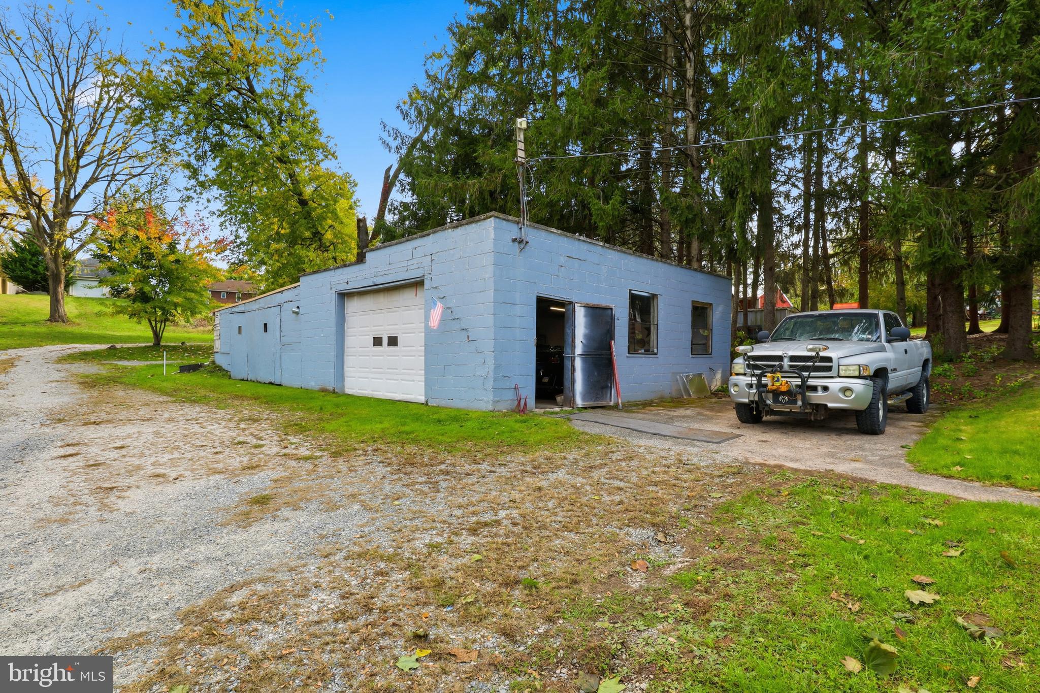 225 North Main Street Manchester, PA 17345 - Photo 35 of 53 a view of a house with a back yard
