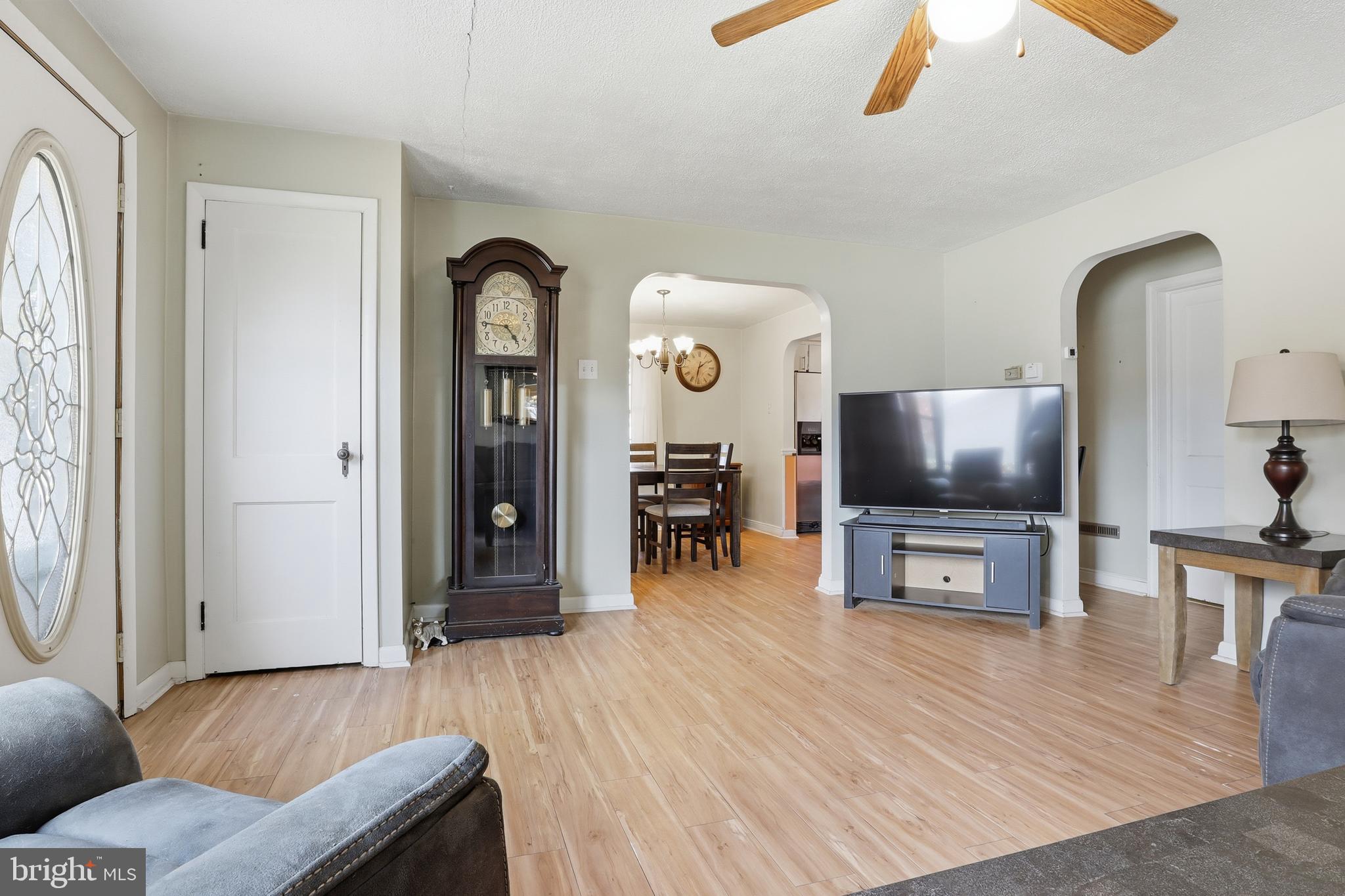 225 North Main Street Manchester, PA 17345 - Photo 6 of 53 a living room with furniture and a flat screen tv