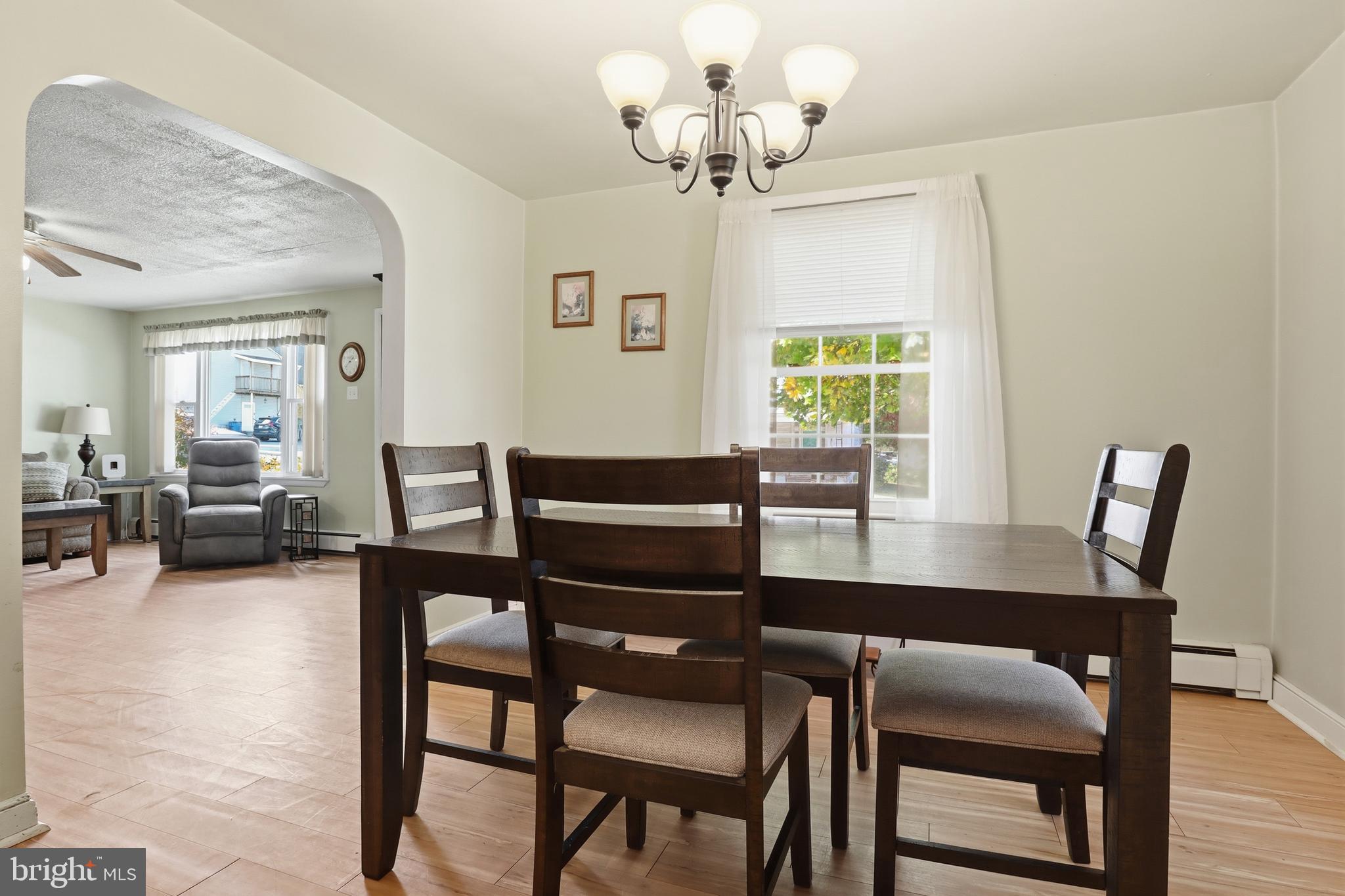 225 North Main Street Manchester, PA 17345 - Photo 8 of 53 a view of a dining room with furniture window and wooden floor