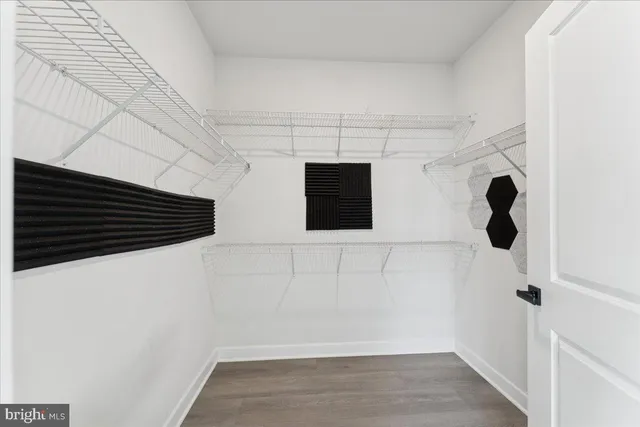 a view of a room with racks on the wall