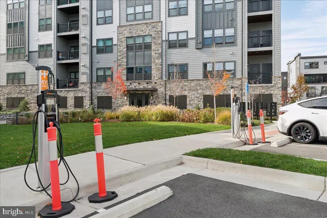 a view of a patio with a table and chairs