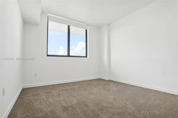 an empty room with a window
