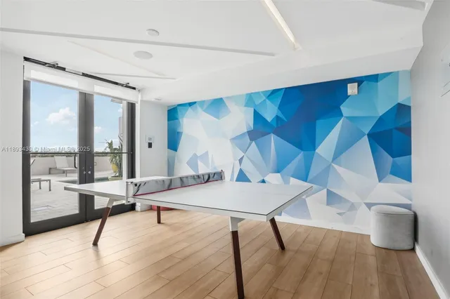 a room with table and chairs