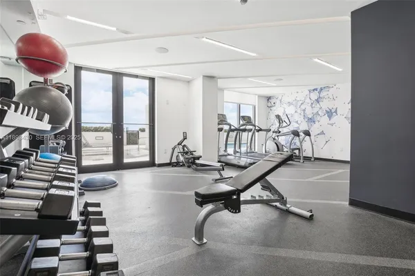 a view of a room with gym equipment