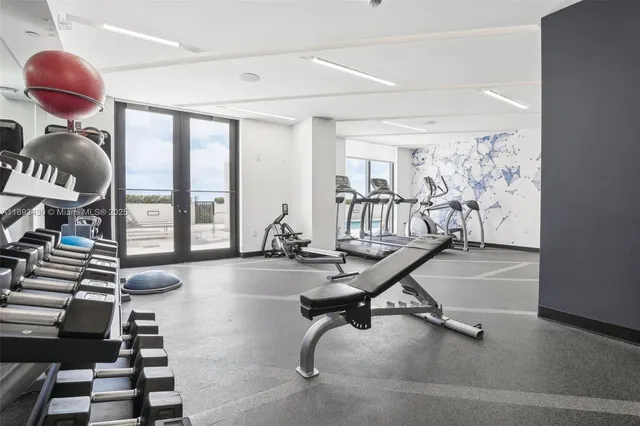 a view of a room with gym equipment