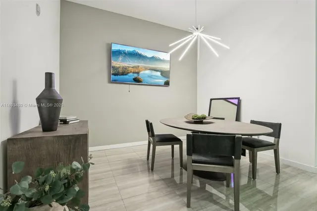 a view of a workspace with furniture