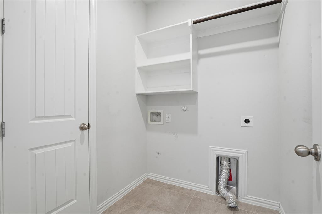 461 Windy Knoll Road Fort Worth, TX 76028 - Photo 19 of 30 a view of an empty walk in closet
