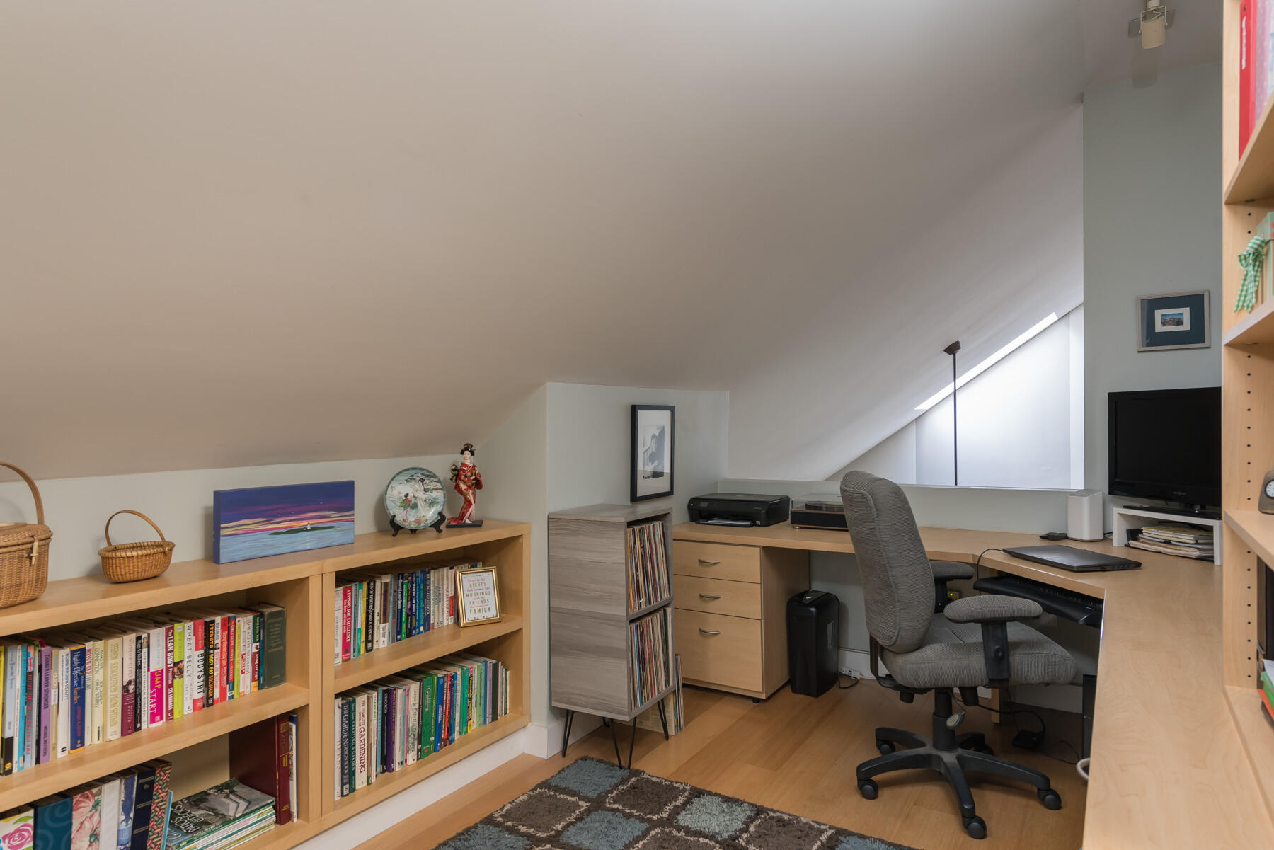 58 Delano Road Marion, MA 02738 - Photo 17 of 41 a view of a workspace with bookshelf