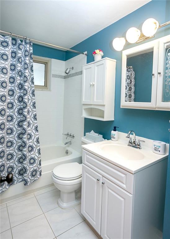 869 Blue Ridge Road Pittsburgh, PA 15239 - Photo 13 of 25 Updated bathroom with subway tile and chrome faucet & shower head.